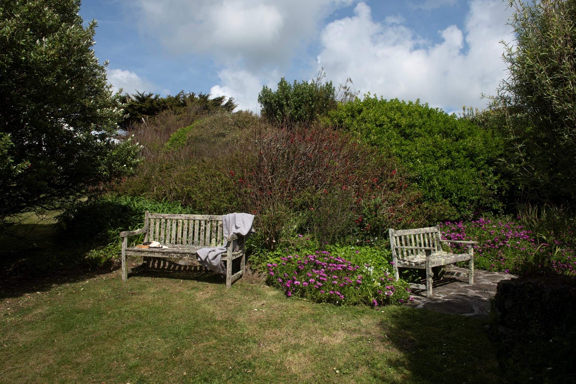 There are plenty of ideal spots for reading or picnics in the garden.
