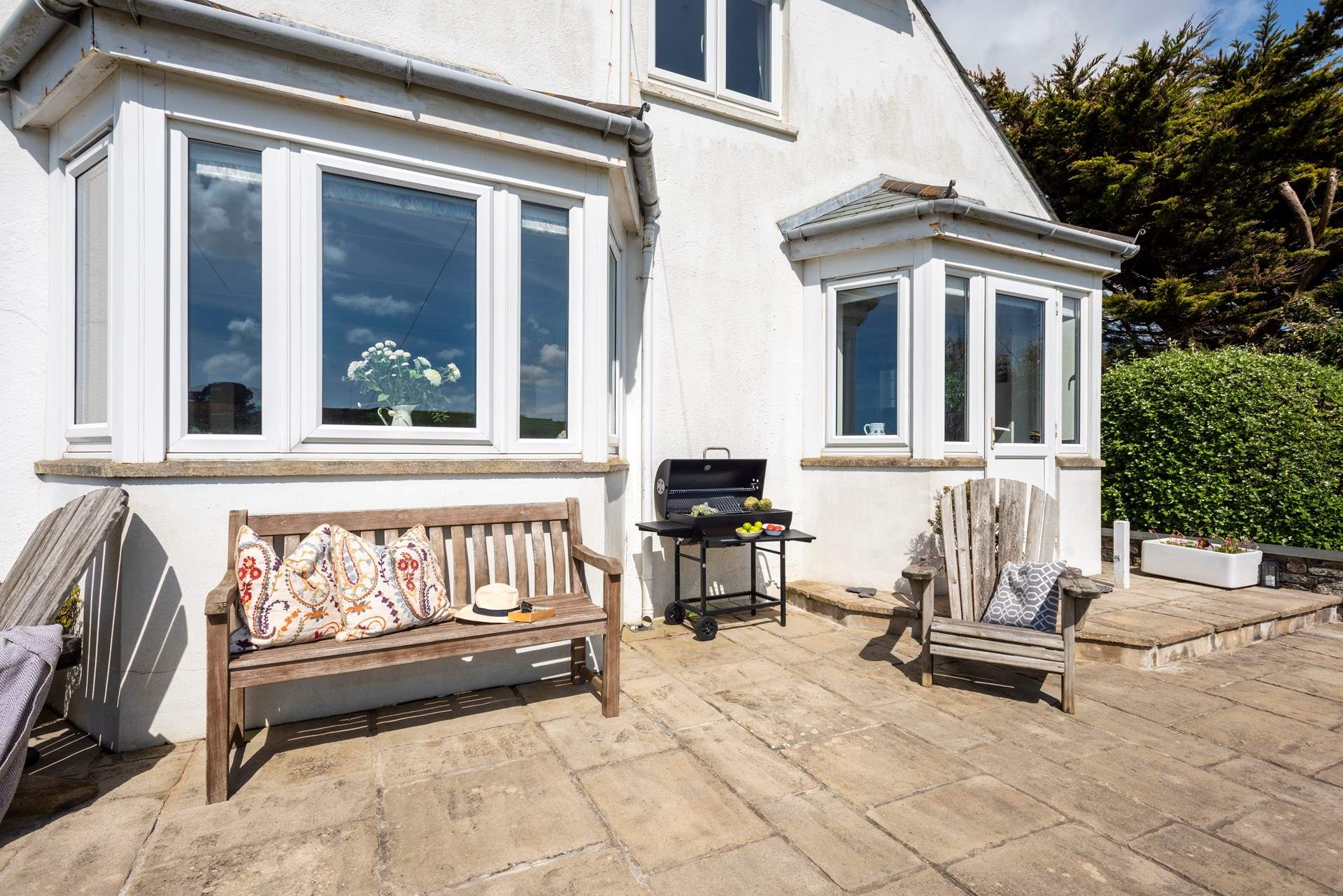 The sheltered barbecue area can be accessed from the kitchen.