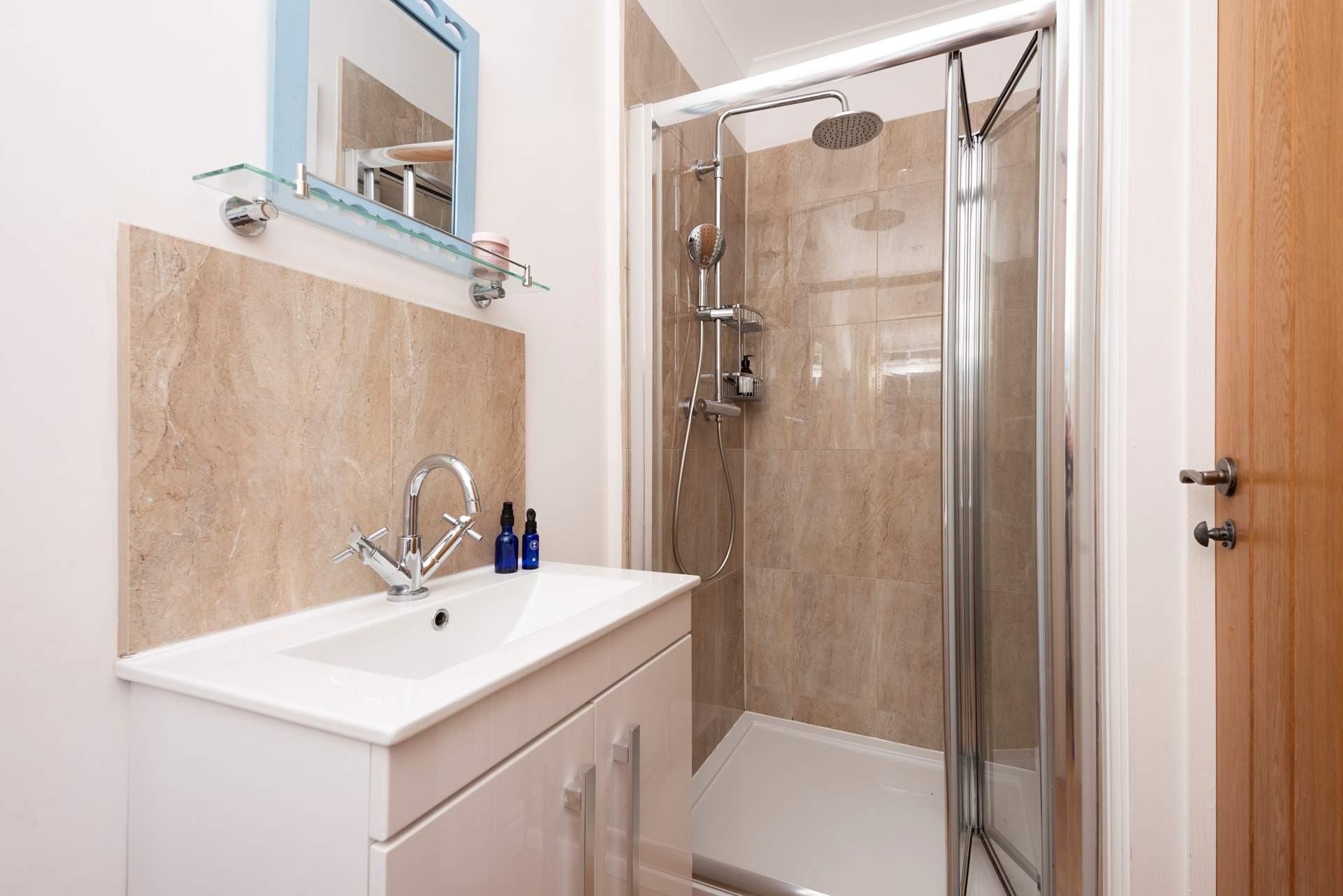 The en suite shower-room to the ground floor twin bedroom.