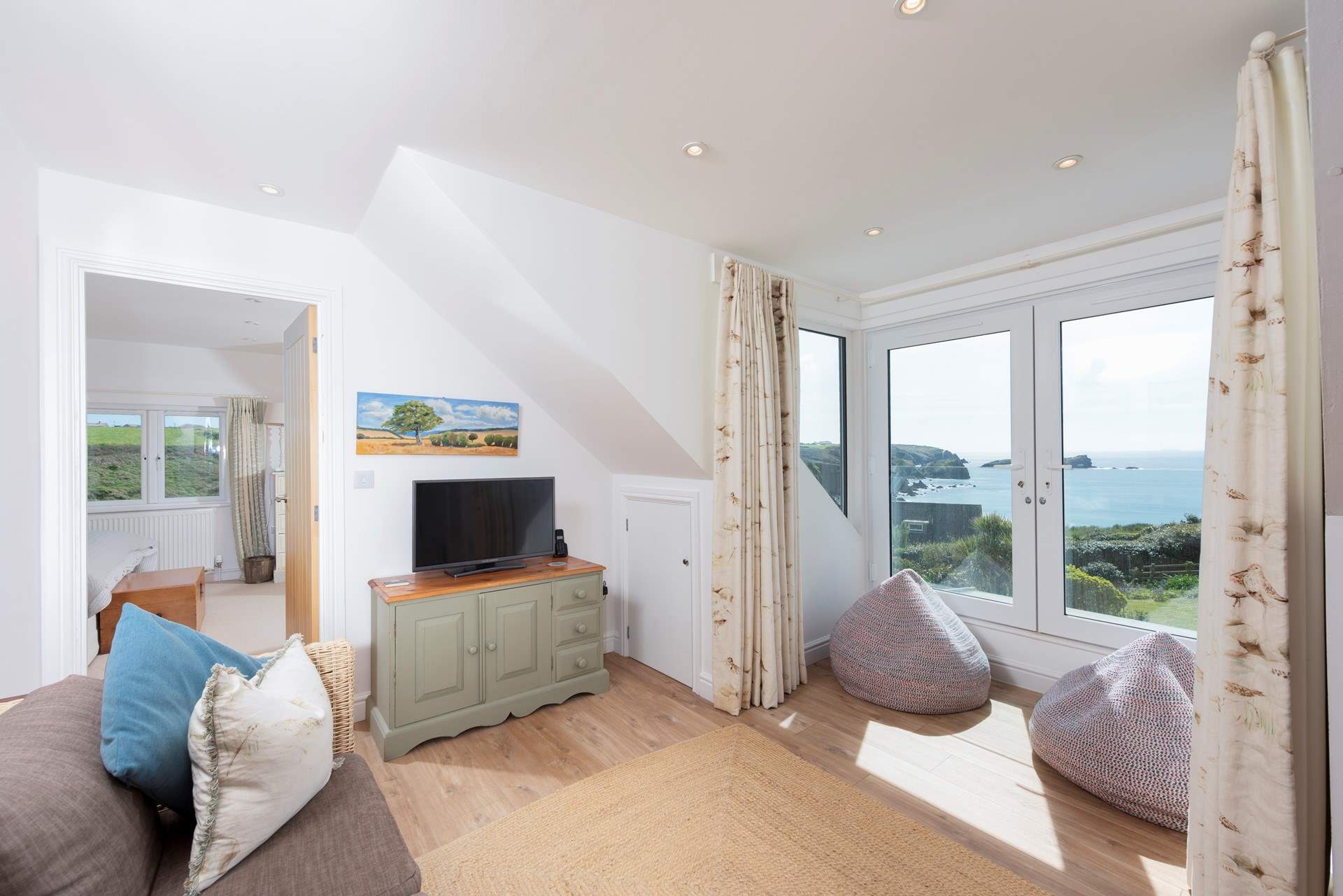 A lovely space for reading before bed beside the stars and the gentle lap of the ocean.
