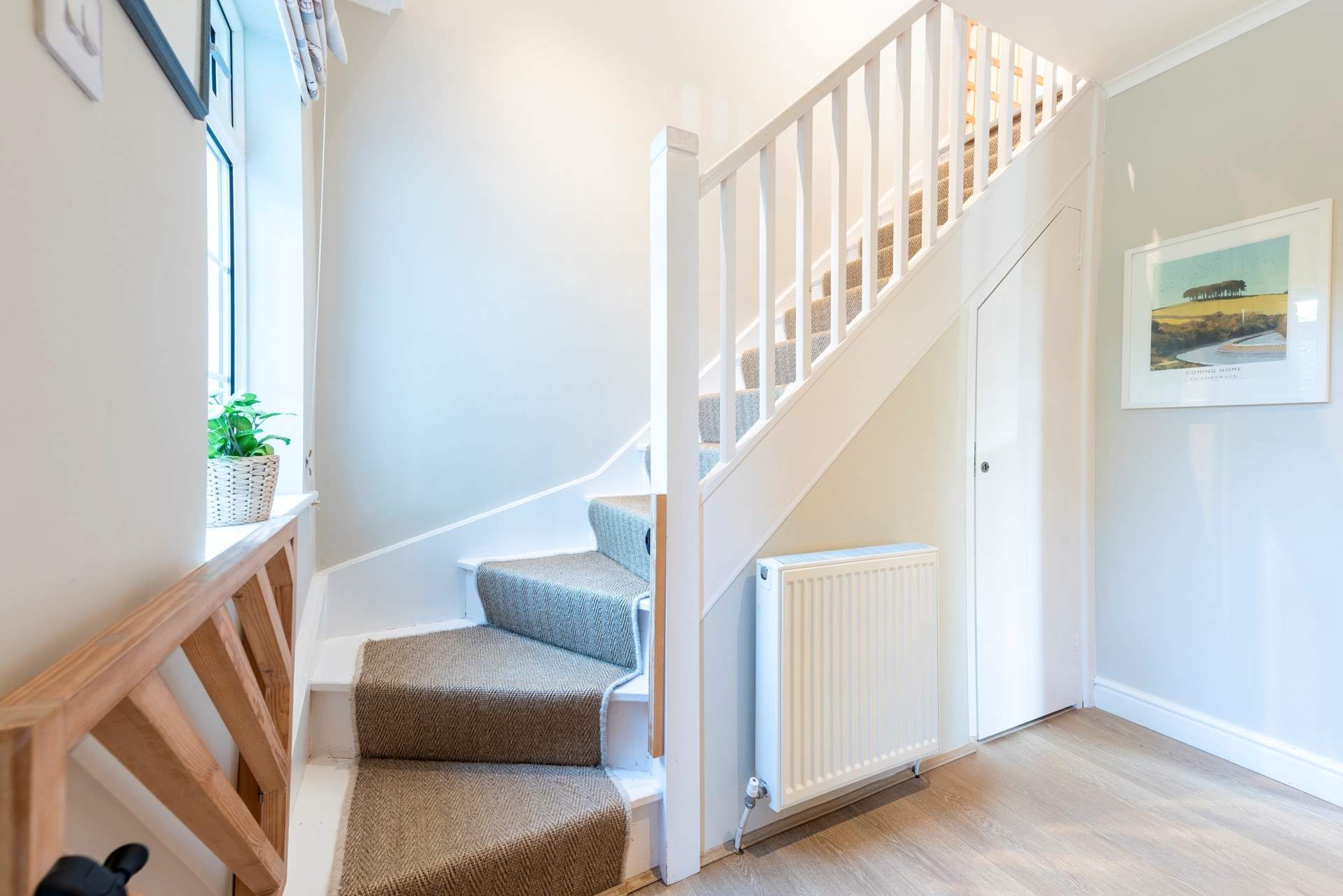 The stairs feature a gate at the top and bottom for additional safety.