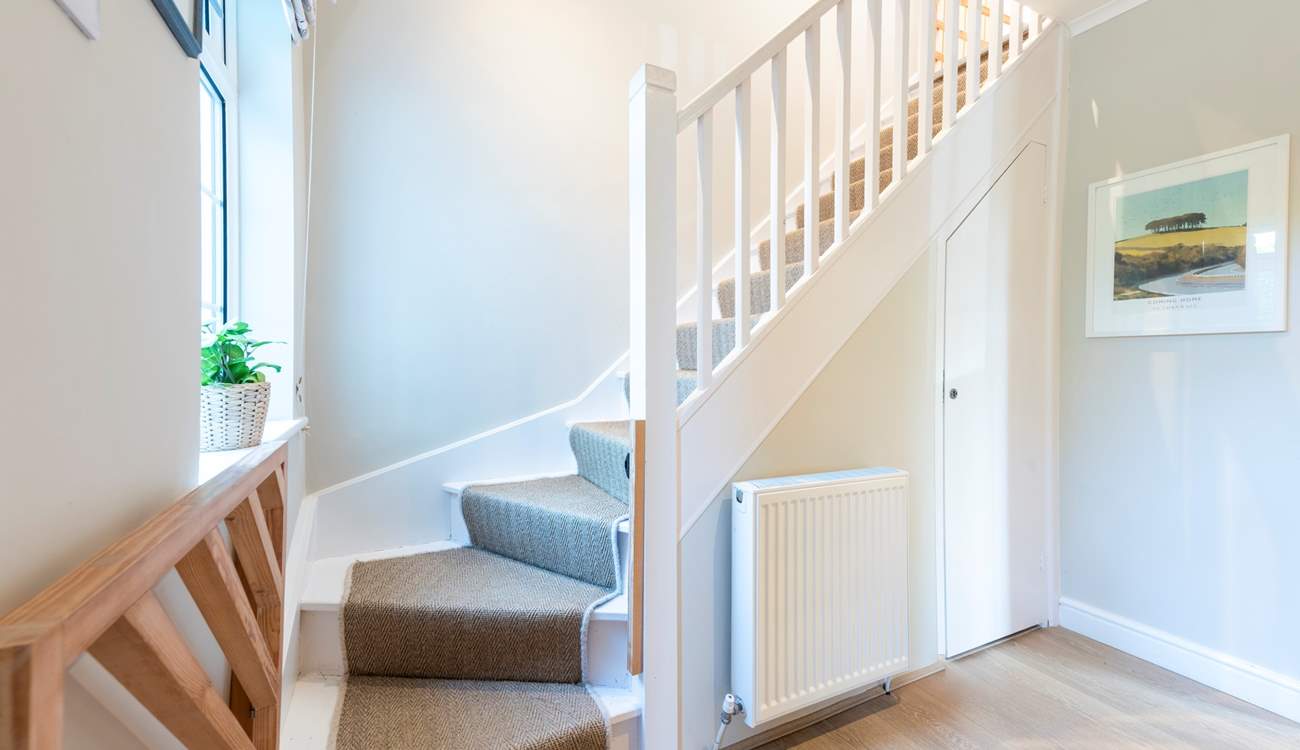 The stairs feature a gate at the top and bottom for additional safety.