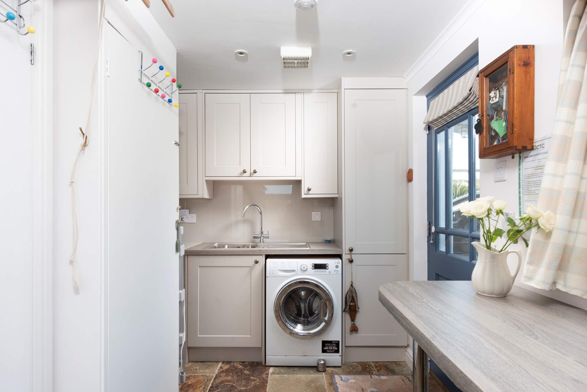 The well appointed utility-room on the ground floor.