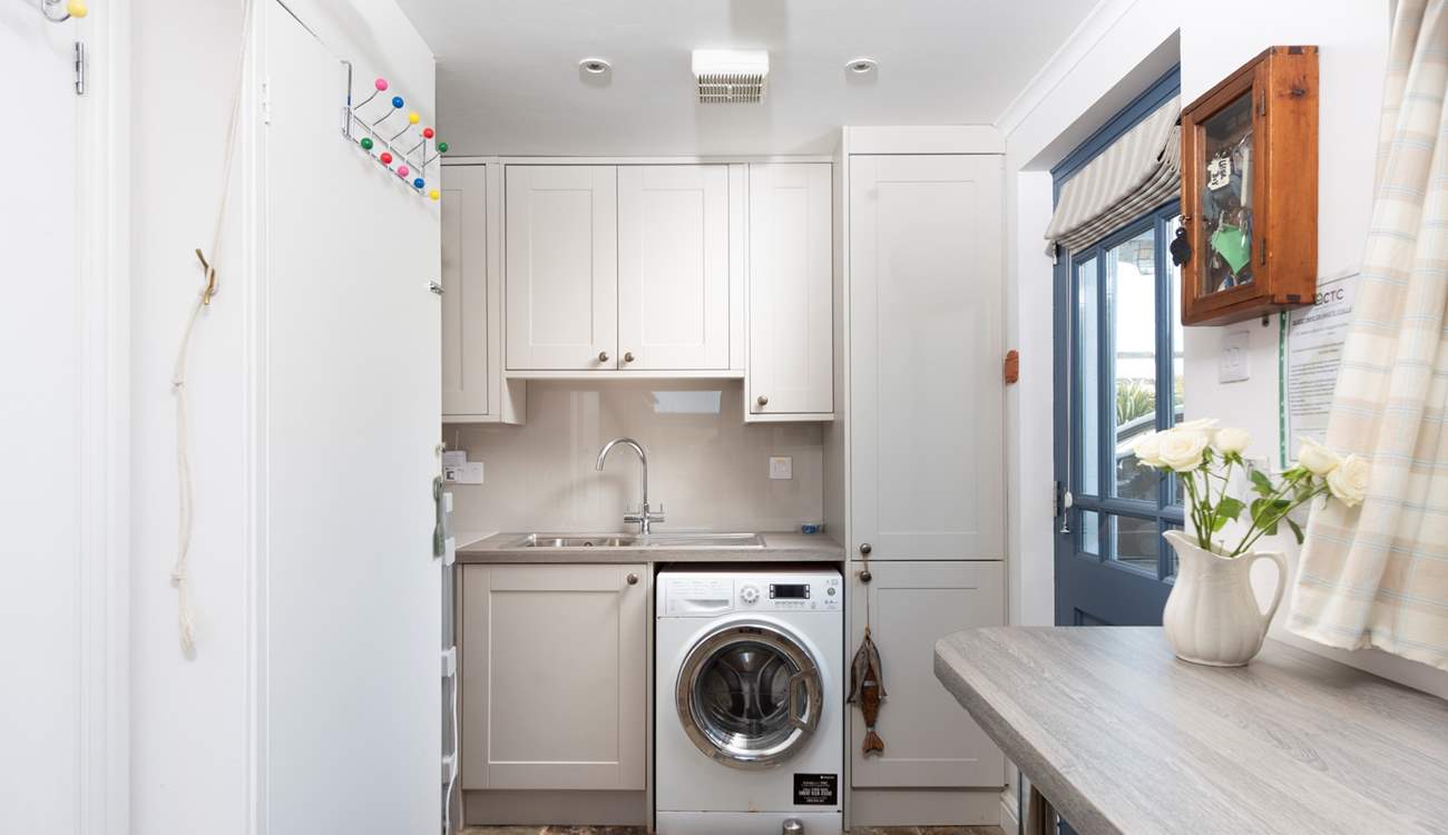The well appointed utility-room on the ground floor.