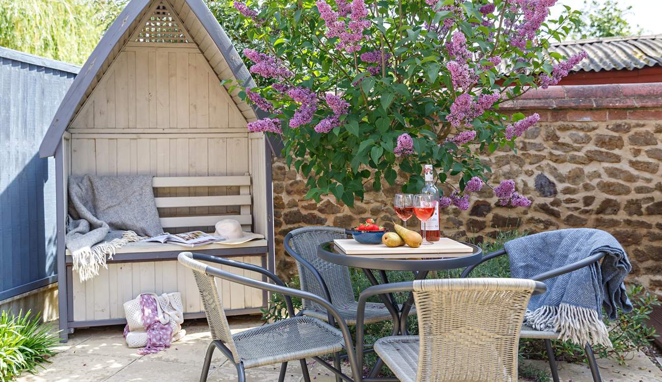 The secluded rear patio is ideal for al fresco dining.