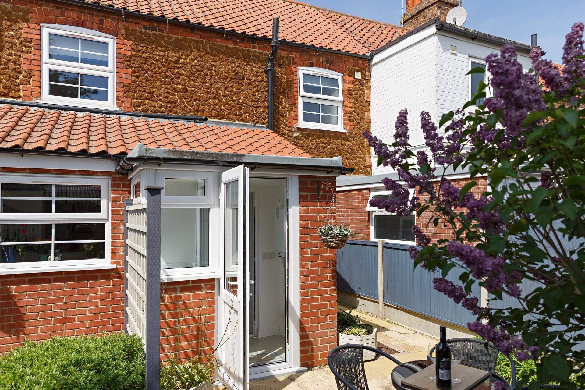 The rear door opens out onto the sunny patio. 