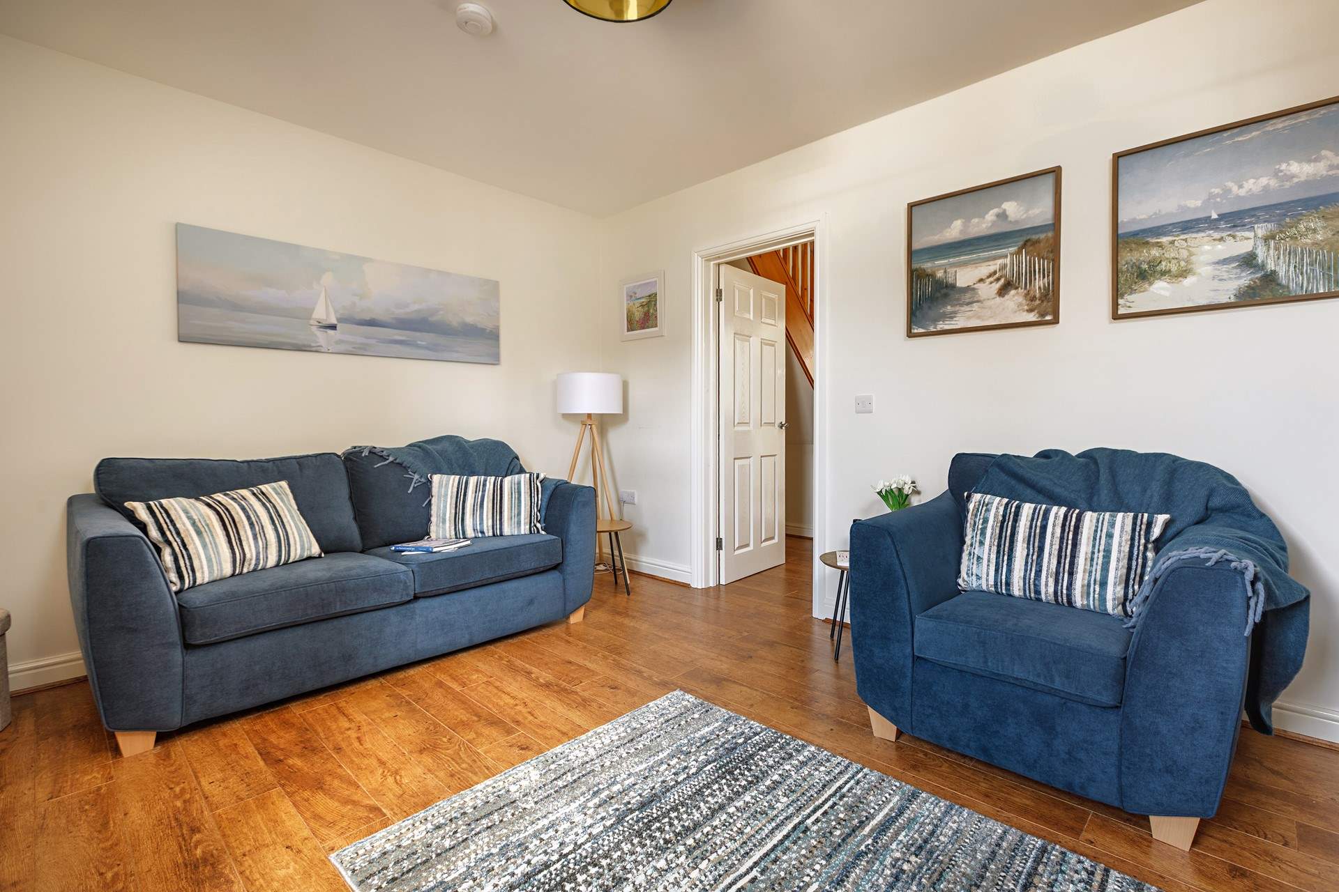 Artwork of local seascapes adorns the walls. 