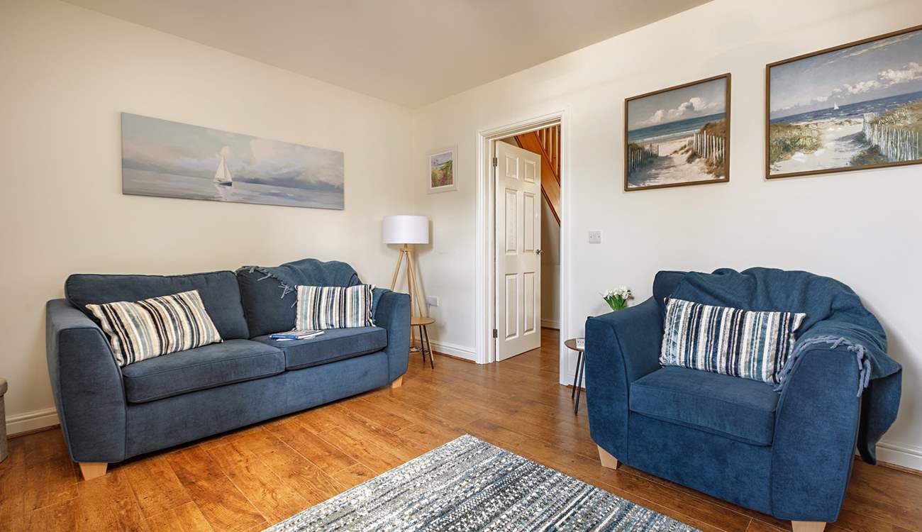 Artwork of local seascapes adorns the walls. 