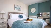 Bedroom 1 has a sumptuous king-size bed.