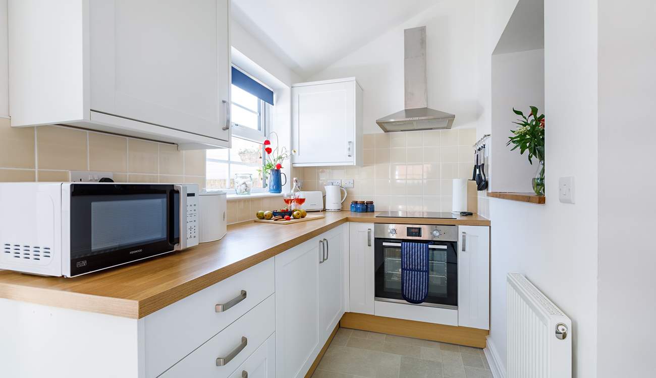 The kitchen area overlooks the patio garden. 