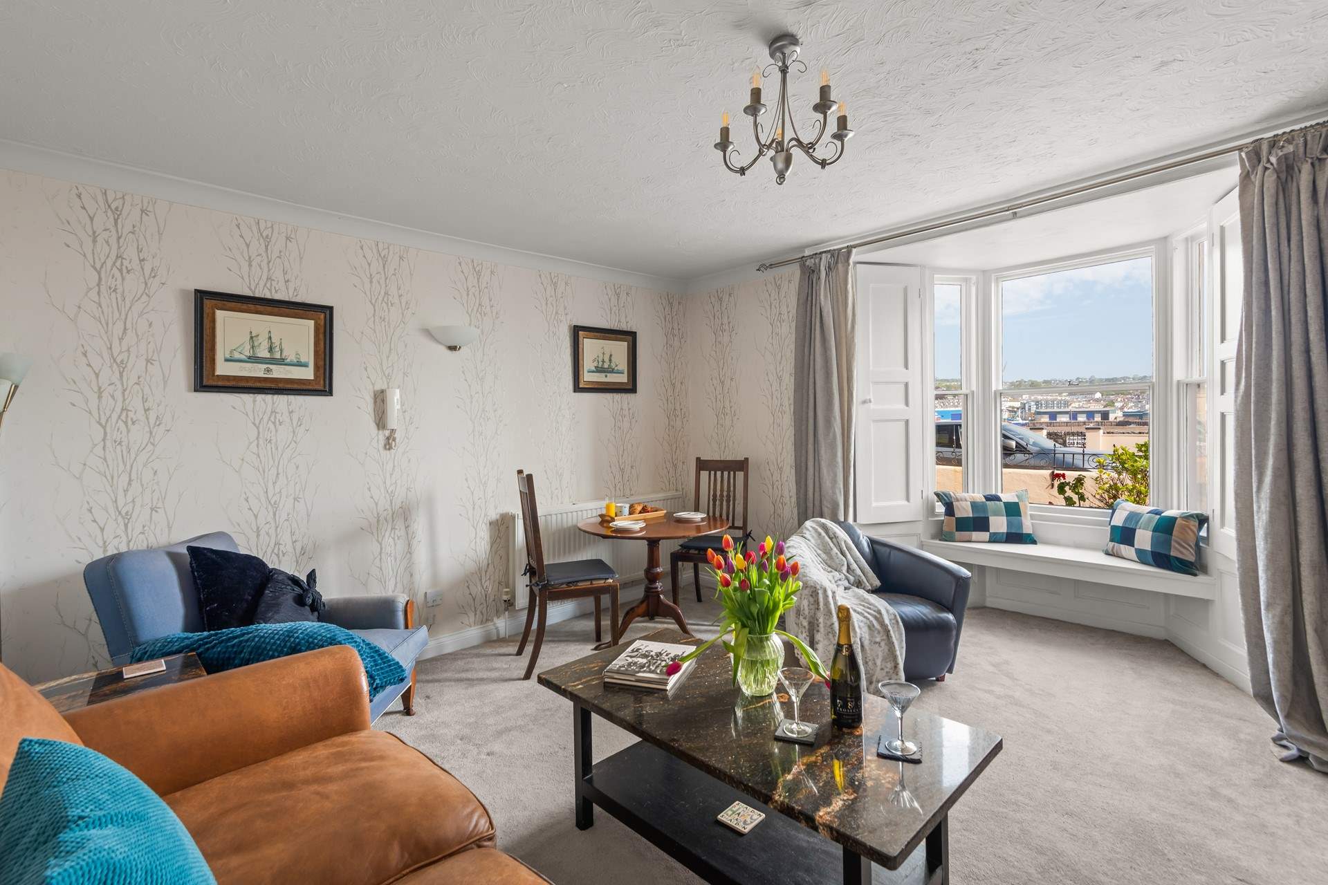 The sitting/dining-room is perfect for two.