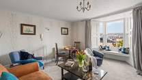The sitting/dining-room is perfect for two.