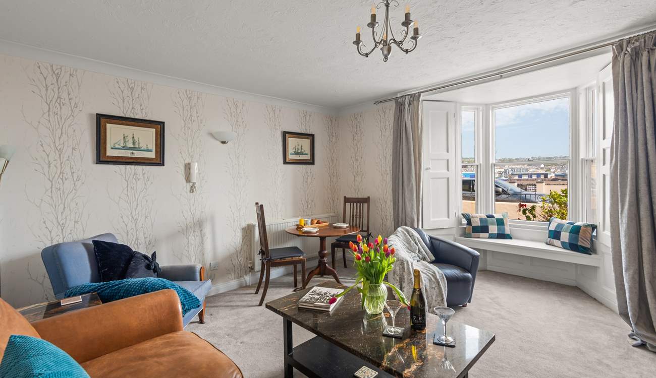 The sitting/dining-room is perfect for two.