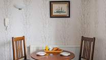 The dining-table is perfectly sized for two.