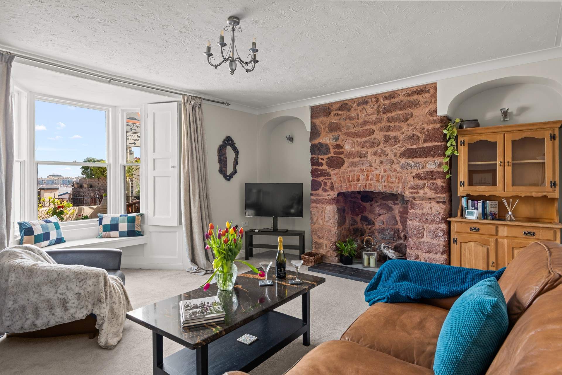 The living space is welcoming and comfortable. Perfect for snuggling up of a night time, or finding your own space with a good book.