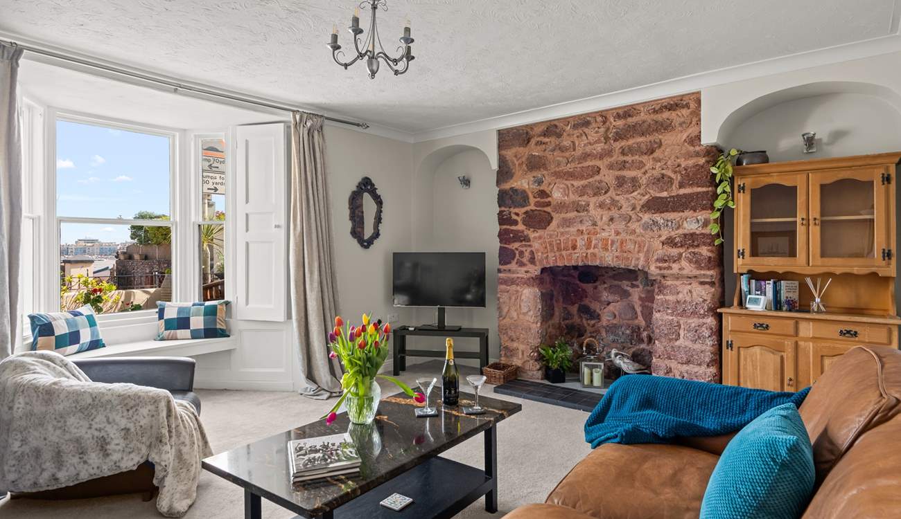 The living space is welcoming and comfortable. Perfect for snuggling up of a night time, or finding your own space with a good book.