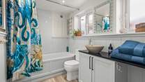 A bright and cheery bathroom.