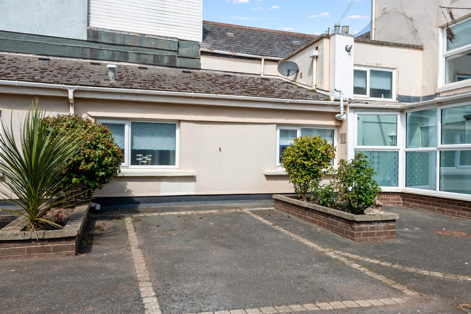 The Sandy Den does offer a parking space, suitable for small to medium sized cars due to the turning space available.