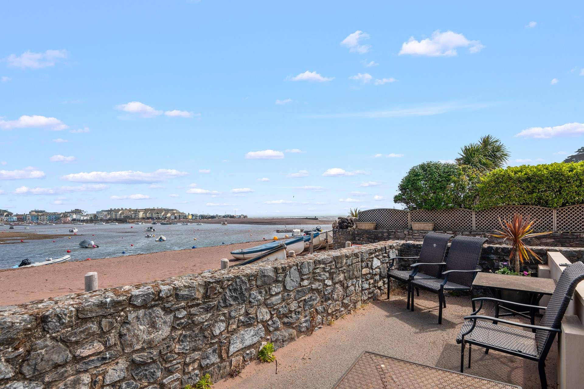 Just outside your apartment, you also have access to this private communal space just off the beach. A great spot to enjoy a good book.