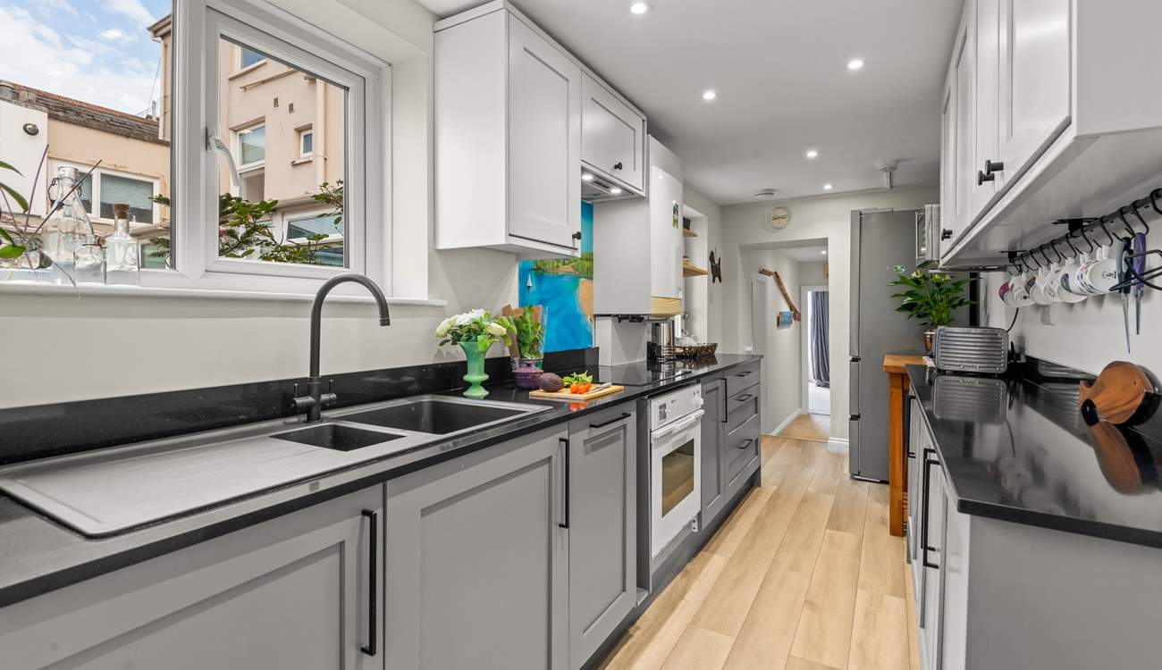 The well-equipped kitchen is perfect for whipping up a feast.