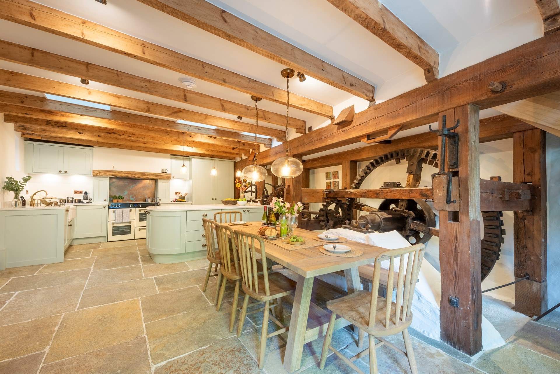 A superb, characterful kitchen/diner with the original mill working machinery preserved inside.