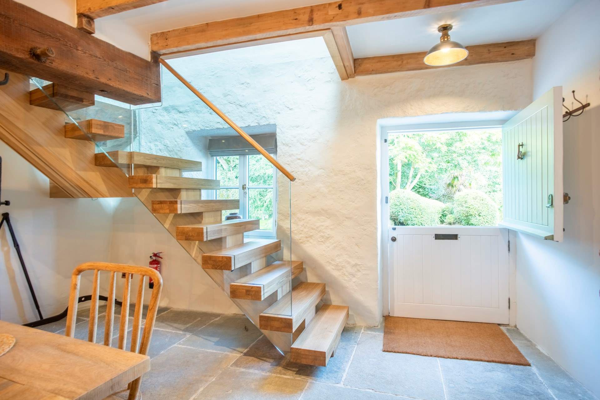 A grand entrance leads you into the kitchen, head upstairs to the sitting-room on the first floor.