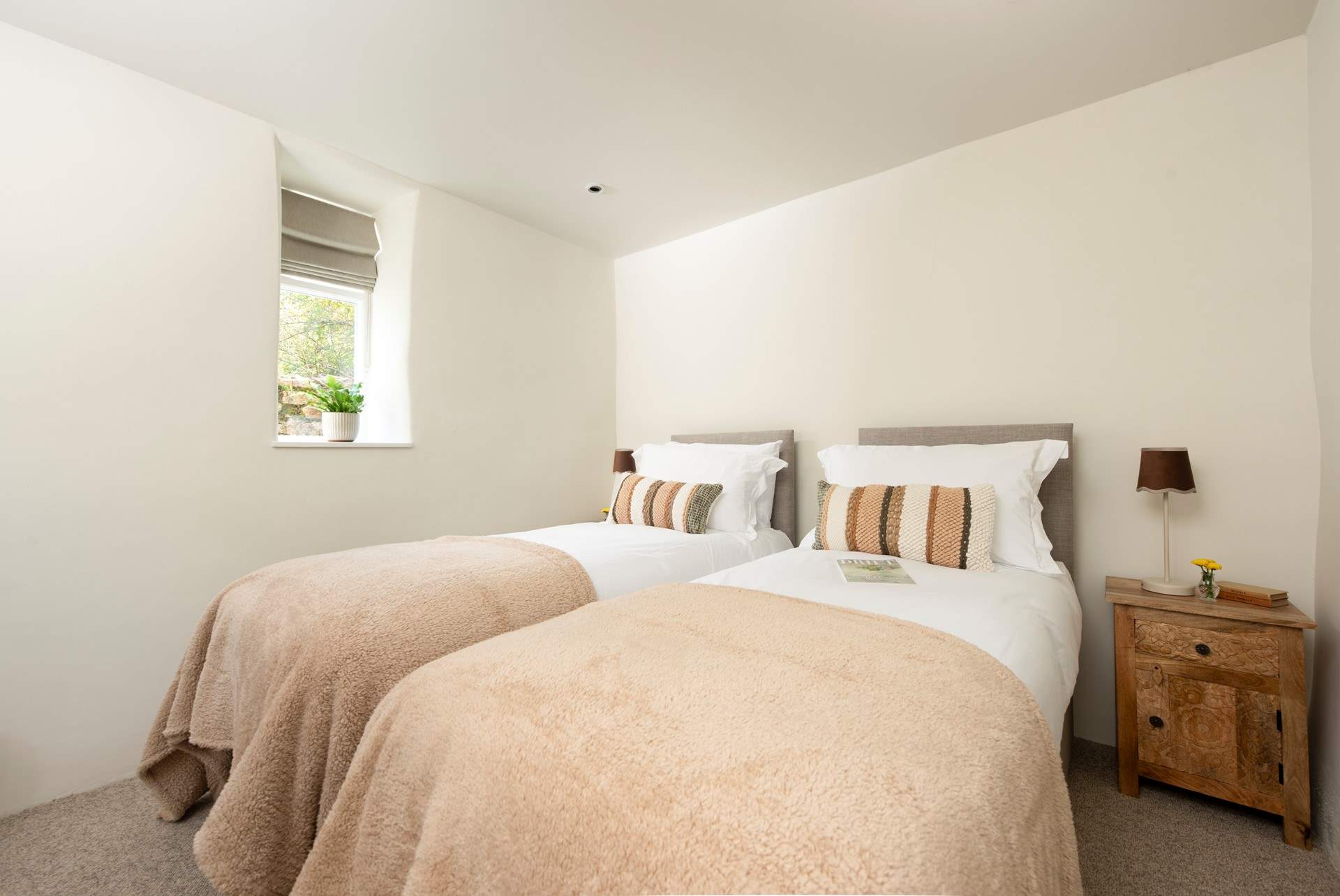 Bedroom 1 is a stylish super-king 'zip and link' located on the ground floor with its own dressing-room. There is also a shower-room close by. 