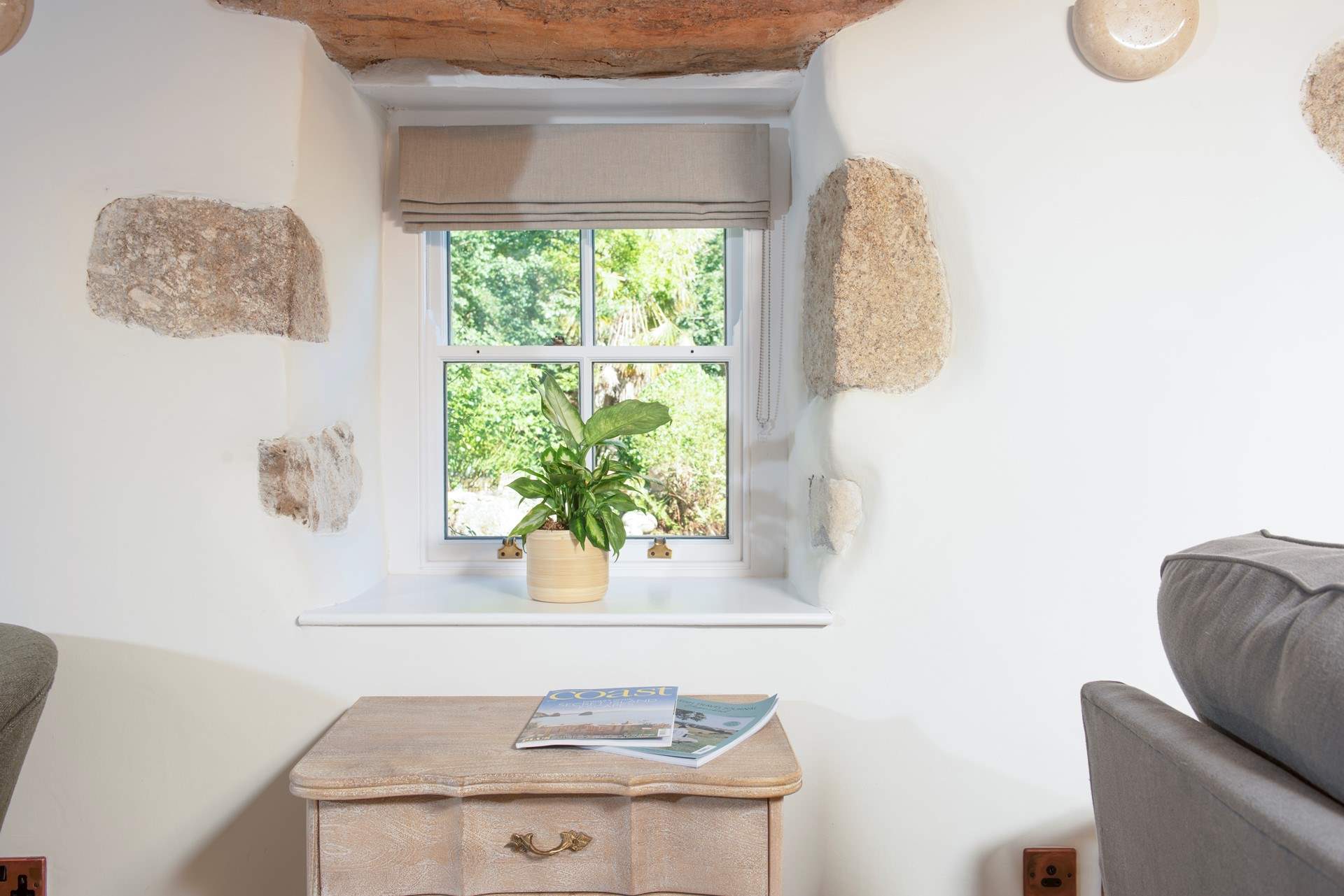 Exposed stonework shows the craftmanship in the original build of this property.