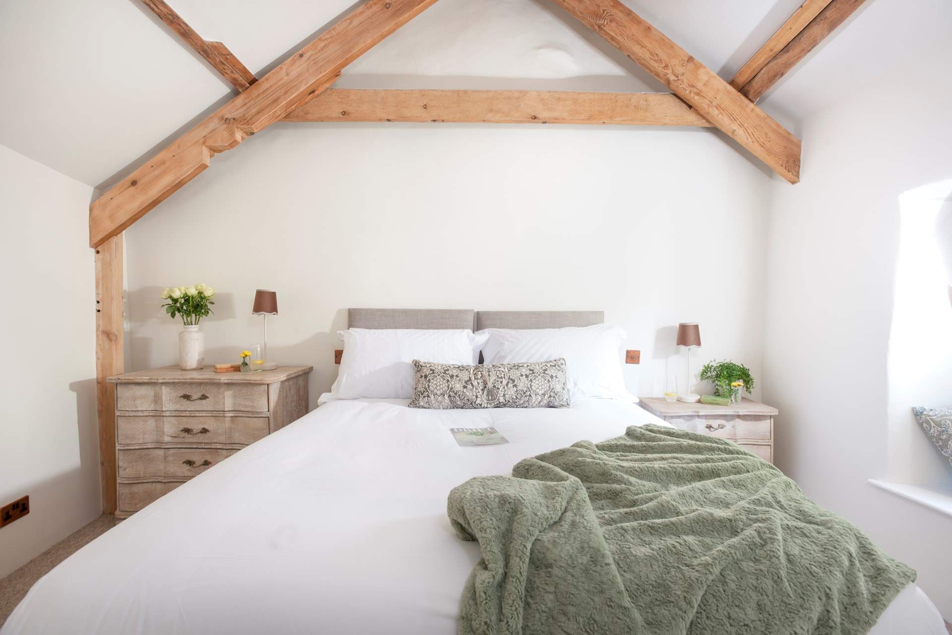 The first of three bedrooms on the first floor is a 'zip and link' king-size overlooking the gardens.