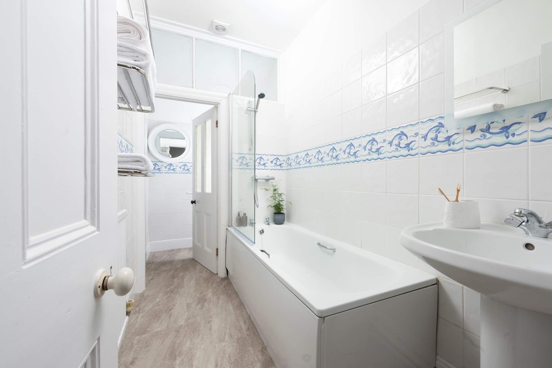 The family bathroom with a separate WC at the end. 