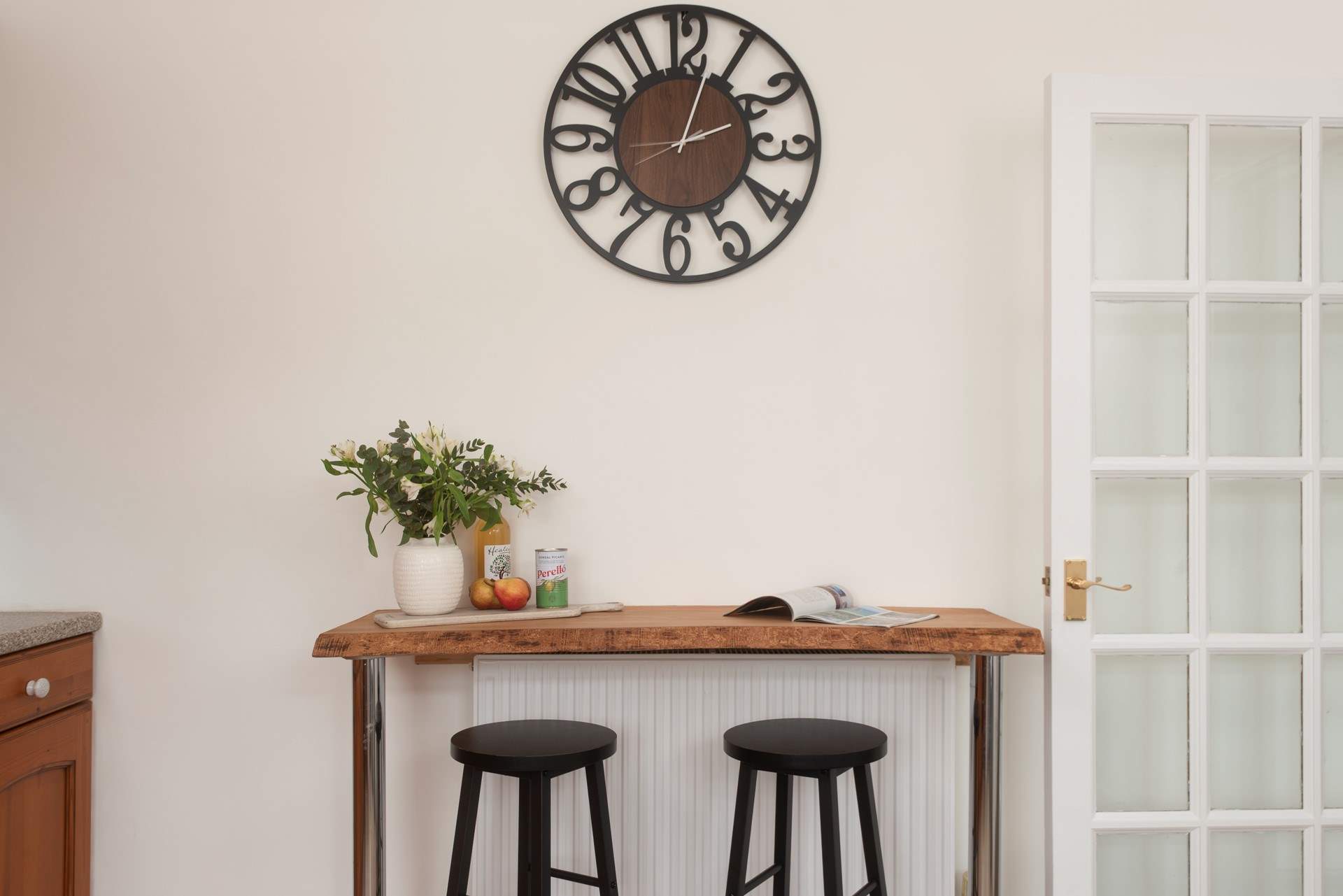 There is a small breakfast bar in the kitchen for a quiet morning coffee.