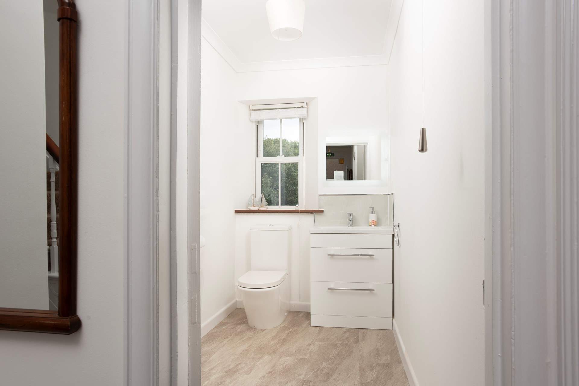 There is a handy downstairs cloakroom.