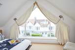 Bedroom 4 has a large window so you can enjoy more of those sea views.