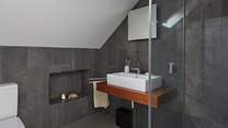 Take a refreshing shower in the second floor shower-room.