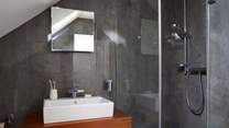 This shower-room is shared by bedrooms 3 and 4.