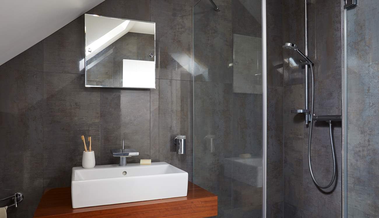 This shower-room is shared by bedrooms 3 and 4.