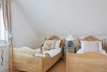 This bedroom is located on the second floor.