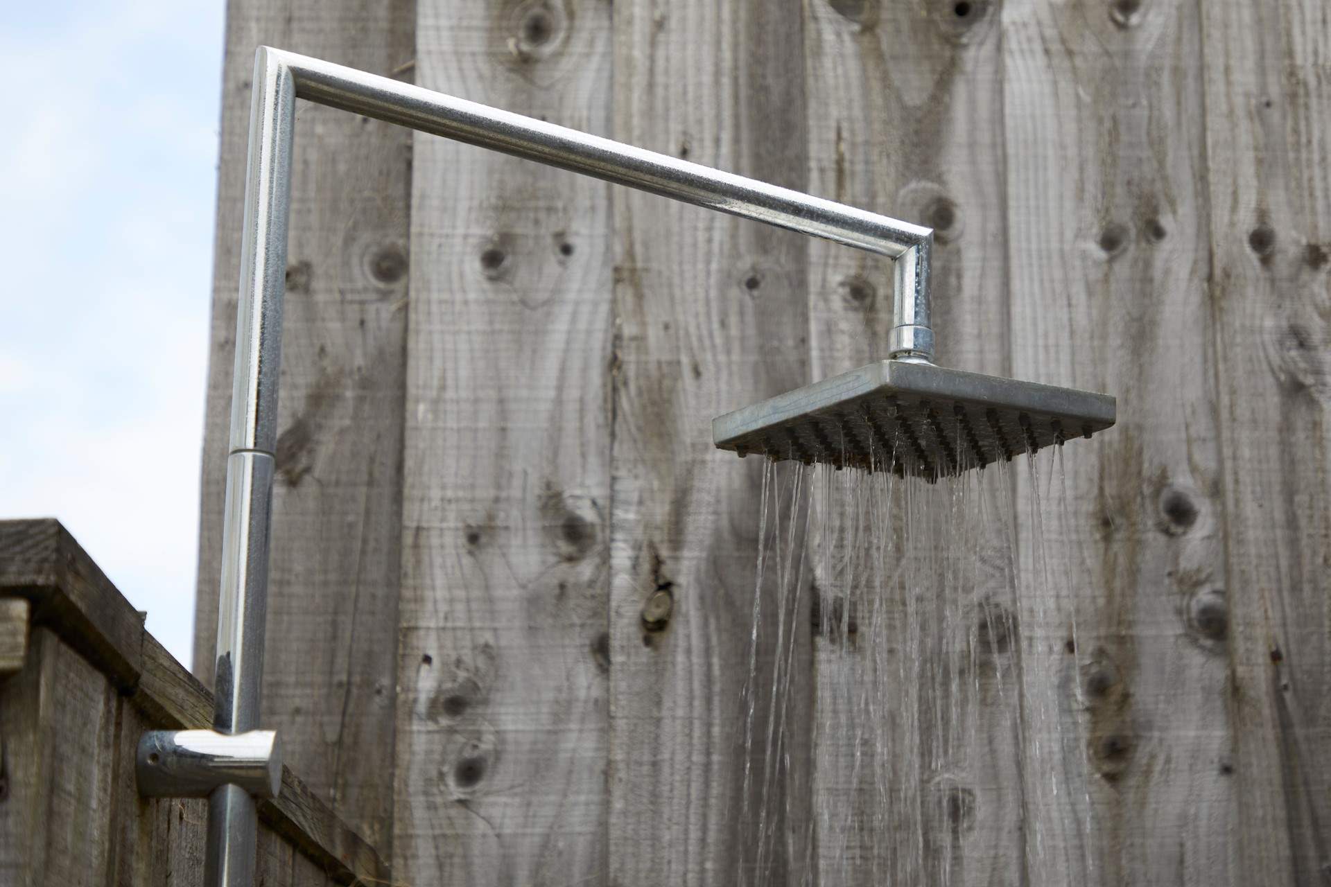 There is even an outside shower in case you need to cool down or wash off those sandy toes.