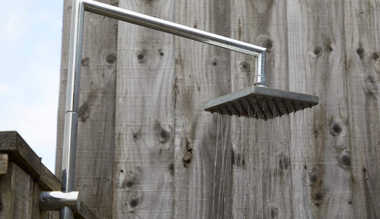 There is even an outside shower in case you need to cool down or wash off those sandy toes.
