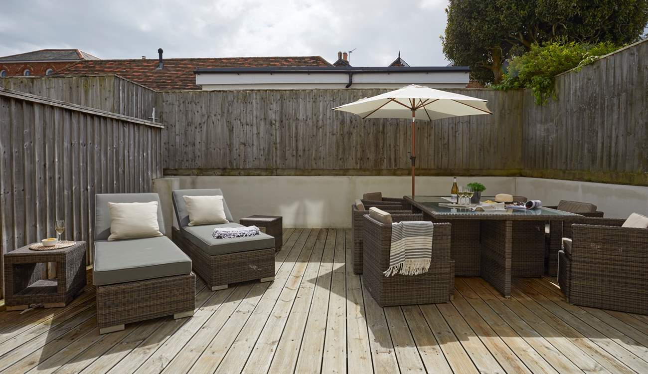 The outside space is a sun-trap, perfect for those who love the warmth of the sunshine.