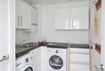 There is a handy utility-room for all your washing needs, or somewhere to store your beach gear.