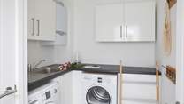 There is a handy utility-room for all your washing needs, or somewhere to store your beach gear.