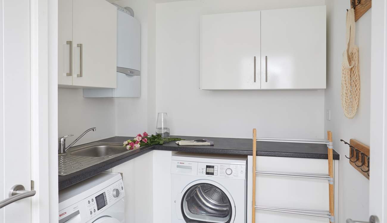 There is a handy utility-room for all your washing needs, or somewhere to store your beach gear.
