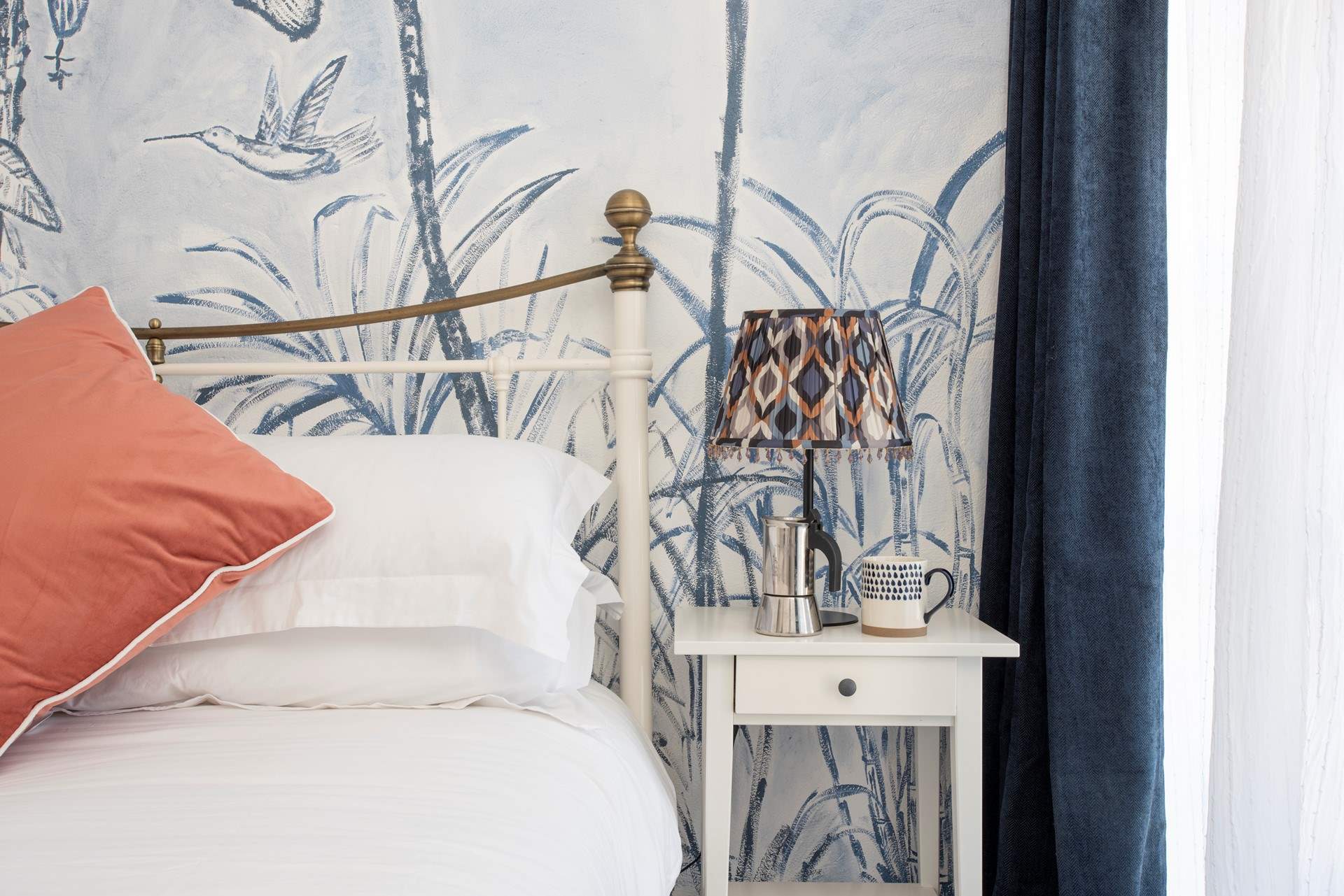 Coastal hues complement chic finishes.