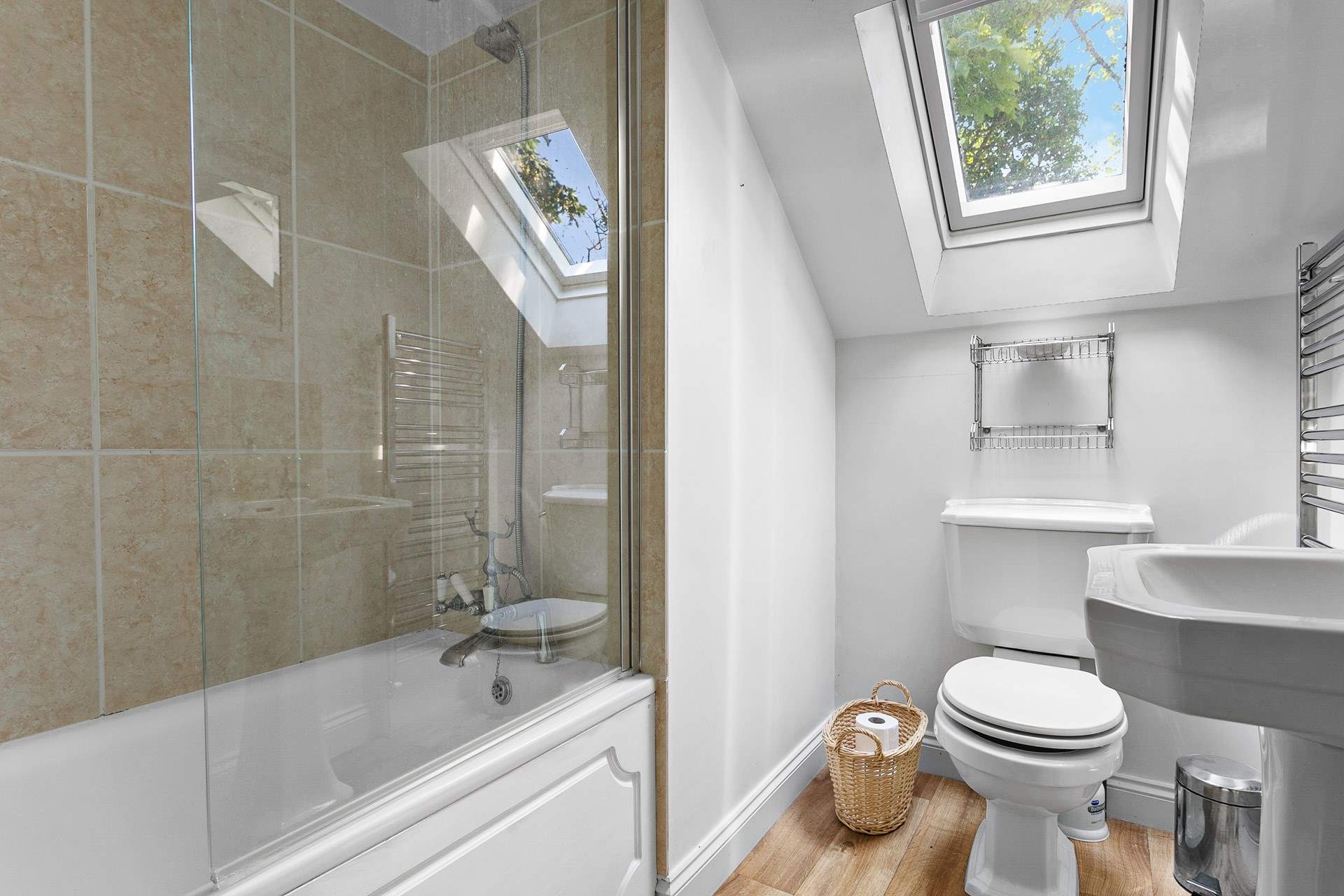 The family bathroom with overhead shower. 