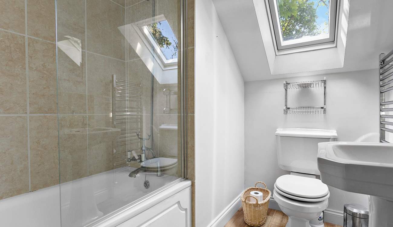 The family bathroom with overhead shower. 