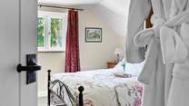 The double bedroom offers comfort and space.