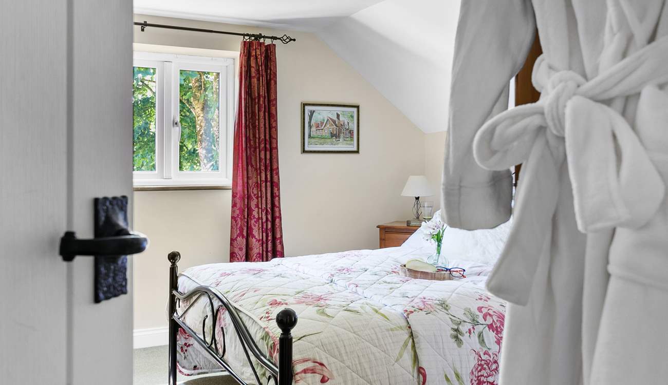 The double bedroom offers comfort and space.