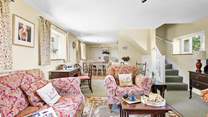 The living-room offers a traditional feeling that makes it feel like home