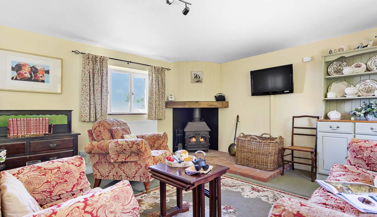 The ground floor is open plan with a cosy and welcoming sitting-area.
